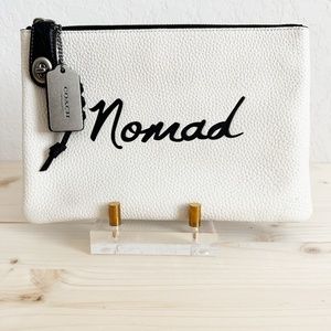 COACH NOMAD TURNLOCK POUCH CHALK/BLACK PEBBLE LEATHER